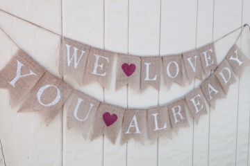 We Love You Already Banner